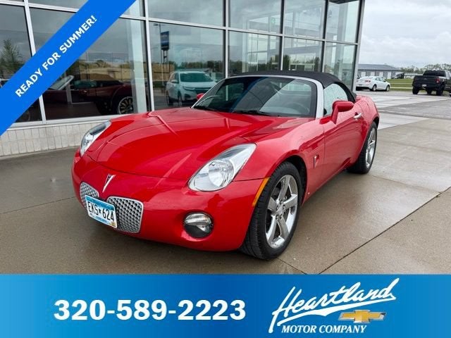 2006 Pontiac Solstice NA in Aggressive Victory Red — front three-quarter view