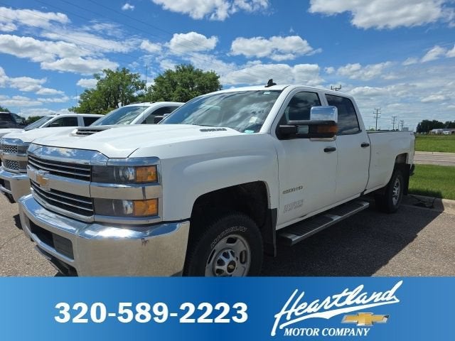 2018 Chevrolet Silverado 2500 HD Work Truck in Summit White — front three-quarter view