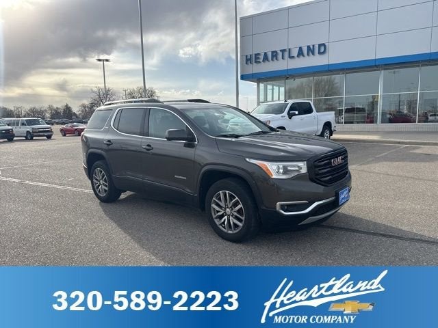 2019 GMC Acadia SLE in Smokey Quartz Metallic — front three-quarter view