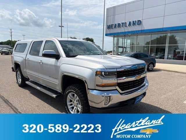 2018 Chevrolet Silverado 1500 LT in Silver Ice Metallic — front three-quarter view