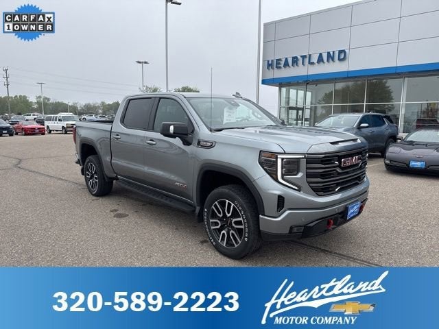 2024 GMC Sierra 1500 AT4 in Sterling Metallic — front three-quarter view